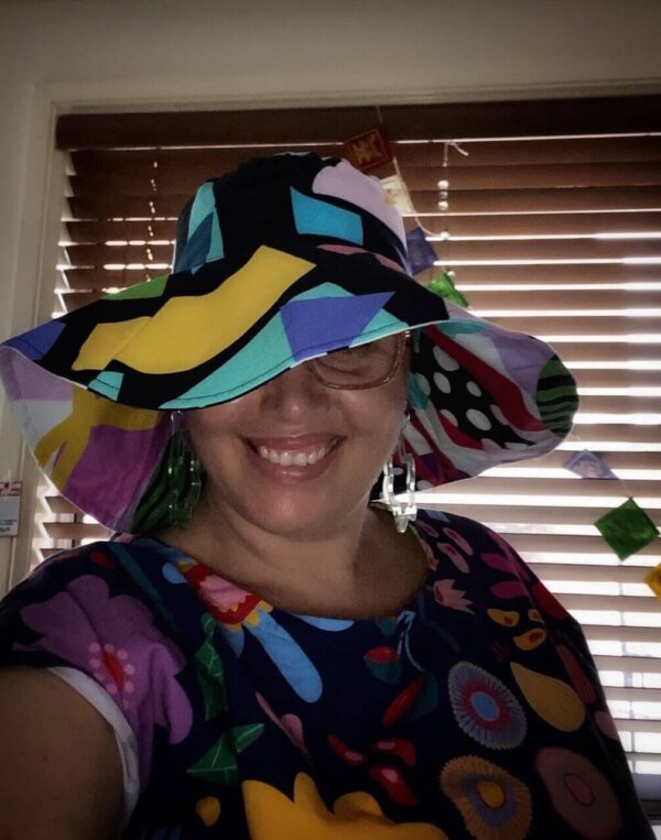 Shape up and Art attack 2-way Hat. Wearing Sunshine Garden dress